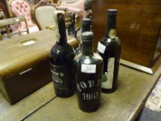 Four bottles of vintage port: Dow's 1963; Porto Messias 1963; Taylor's White; and Offley Boa