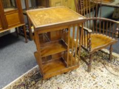 An early 20th century oak revolving bookcase, of characteristic form, with chamfered uprights. 0.83m