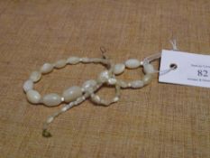 A single strand of graduated moonstone beads. Length 47cm