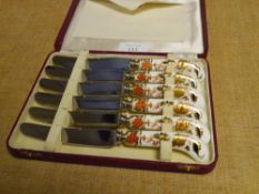 A cased set of six Royal Crown Derby Imari pistol handled tea knives