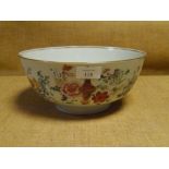 A Chinese porcelain punch bowl, painted in famille rose enamels with Precious Objects (rim chip