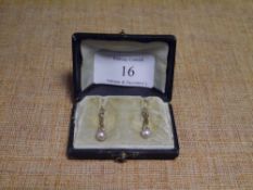 A pair of Continental 14ct gold seed pearl drop earrings, with hoop fittings. Length c. 27mm