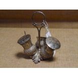 A late 19th century silver plated thistle-form condiment set, salt pepper and mustard