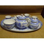 A Royal Worcester porcelain cabaret set in the Willow pattern, factory mark for 1902, comprising