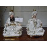 A pair of Jacob Petit porcelain figural scent bottles, c. 1870, modelled as seated Turkish