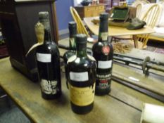 Four bottles of vintage port: Porto Messias 1963; Offley Boa Vista; Taylor's Late Bottled 1974;