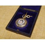 A late Victorian lady's fob watch, the gilt dial and chapter ring with Roman numerals, the case
