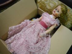 Box containing a mid 20th century doll, bed, miniature globe (a lot)