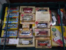 Crate containing a collection of boxed model vehicles including Lledo