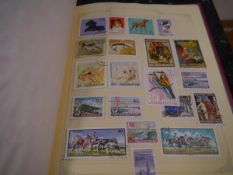 Album containing a collection of Hungary stamps (100's)