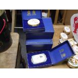 Four Halcyon Days boxed enamel boxes including a pot pourri pail, bi-centenary of The Times and