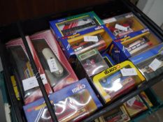 Crate containing a collection of boxed model vehicles including Corgi