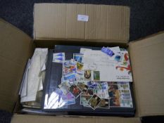 Box containing some mixed stamps in packets and envelopes, also some silk edition first day covers