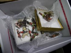 Box containing a group of Britain's and other painted military models including cavalry, Highland