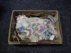 Small box containing old world stamps (270 grams net)