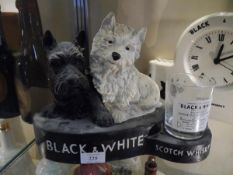 20th century black and white Scotch whisky pub advertising display with glass