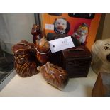 Collection of treacle glazed pottery money banks including town crier and column chest, (some af),