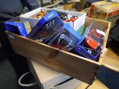 Two boxes containing a quantity of Scalextric model cars and track