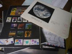 Collection of presentation stamp packs including Apollo 8