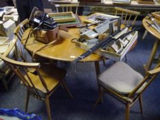 Mid 20th century Ercol elm kitchen dining table with five spindle back dining chairs