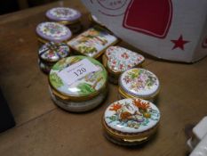 A group of Halcyon Days enamel trinket boxes including croquet, royal commemorative etc (6);