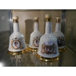 Collection of Bells whisky royal commemorative decanters including 60th birthday of Her Majesty