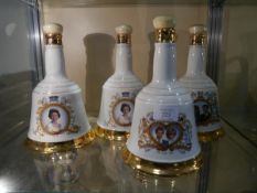 Collection of Bells whisky royal commemorative decanters including 60th birthday of Her Majesty