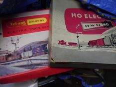 Tri-ang Hornby electric train set, a Ho electric train set, an airplane kit (3)