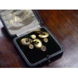 Cased set of four gentleman's 9ct gold dress studs; together with a pair of yellow metal chainlink