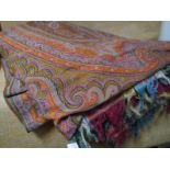 Late 19th century woollen paisley shawl, in a palette of orange, green and blue, with multi coloured