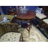 Early 20th century inlaid mahogany occasional table, of circular form, on splayed legs, joined by