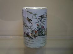 Chinese porcelain brush pot, in the famille verte palette, painted with ducks in a landscape, red