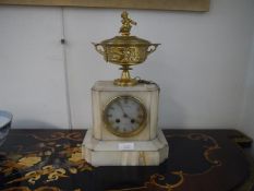 Late 19th gilt metal mounted alabaster mantle clock, the dial signed Miroy Freres, Paris with