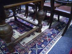 Kazak style silk pile machine woven rug with triple medallion centre enclosed within a bird animal