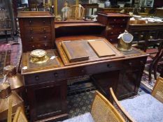 19th century mahogany pedestal desk, the superstructure fitted with drawers and compartments over