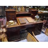 19th century mahogany pedestal desk, the superstructure fitted with drawers and compartments over