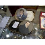 Two 19th century portrait miniatures, oval, one a young gentleman c. 1830, the other c. 1850. (2)