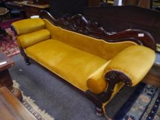 Victorian mahogany framed sofa, with scroll ends, the back with shield and leaf-carved crest rail