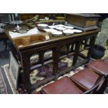 Late 19th century oak altar table, the rectangular top raised on chamfered legs joined by carved