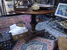 19th century Continental parcel-gilt mahogany occasional table, the circular top raised on a part