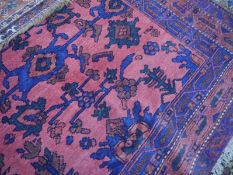 Turkeman rug, the centre panel of interlocking foliate design enclosed within a triple stylised