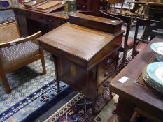 Edwardian satinwood inlaid mahogany Davenport, of characteristic form, inlaid with oval paterae. 0.