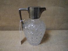 Late Victorian silver-mounted cut-glass claret jug, Hukin & Heath, London 1899, possibly a design by