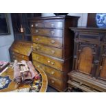 George III oak chest on chest, the moulded cornice above two short and three long graduated