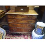 Small George III mahogany chest of drawers, with moulded rectangular top above four long graduated