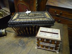 Late 19th century Ceylonese porcupine quill casket, the cover with hinged brass handle, over open