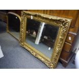 Large 19th century gilt-composition picture frame, elaborately moulded with shells, c-scrolls and