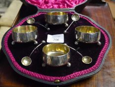Late Victorian cased set of four silver cauldron salts, Mappin & Webb, London 1900, with spoons,