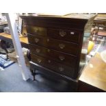 A George III mahogany chest on stand, with moulded dentilled cornice above a fretwork-carved