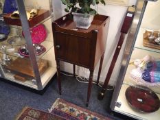 A 19thc mahogany tray top pot cupboard, raised on turned supports. H82cm. D35cm. W35cm